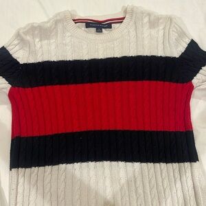 This is a tommy hilfiger sweater, size M.